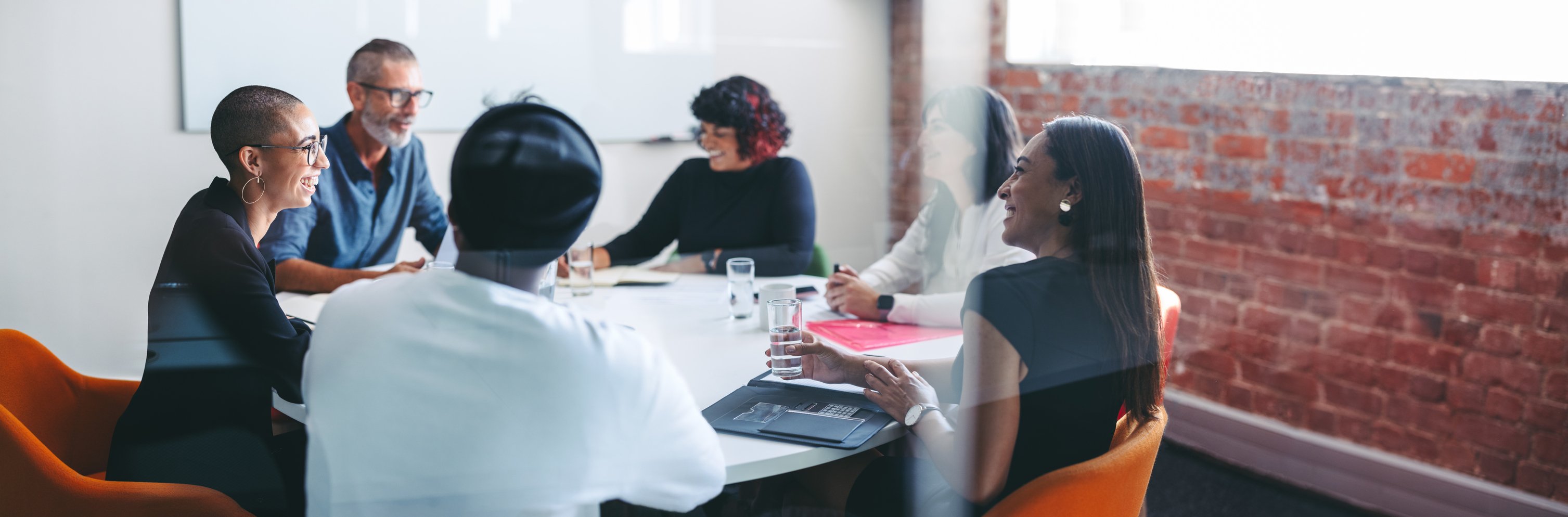 Finance industry HR team at an investment or venture capital firm discussing their top challenges and strategizing solutions